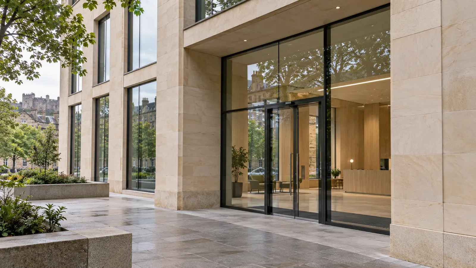 Sandstone and glass entrance to a contemporary commercial building in Edinburgh